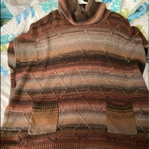 Turtleneck poncho.